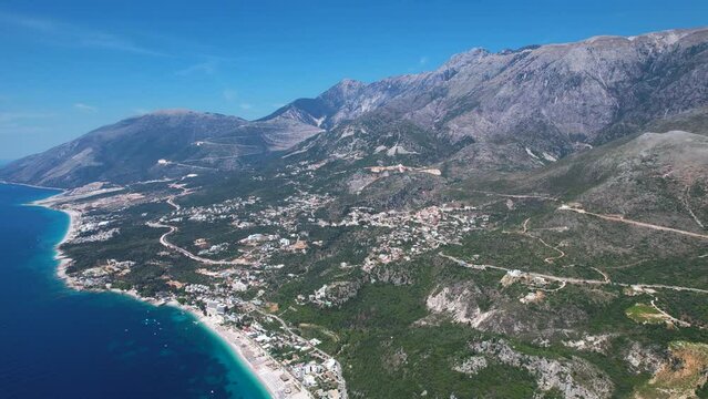 Ionian Bliss: Tourists' Paradise by the Blue Shores, Resorts, and Villas Along Vast Beaches in Albania's Summer Escape