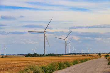 Wind turbines in a field. Renewable energy