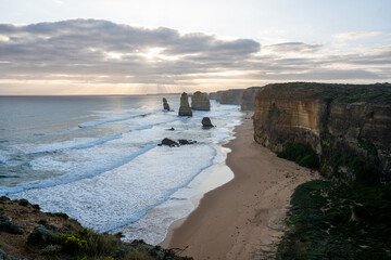 Marvel at the rugged beauty of the Australian coastline at the 12 Apostles, where dramatic rock formations meet the endless blue sea, a must-see destination for coastal enthusiasts and travelers.