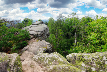 Fototapeta na wymiar Ctyri palice rock formation in the day, Zdarske vrchy mountain - Vysocina, Czech republic