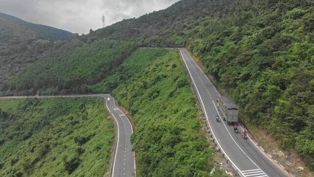 Flying above the Hai van pass Vietnam busy road, aerial