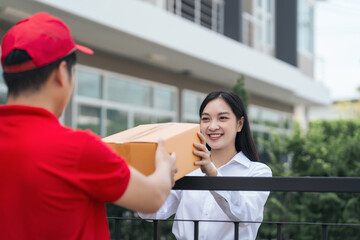 Asian people received product box from male delivery service person, modern e-commerce, home...