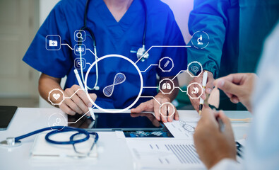 Medical technology network team meeting concept. Doctor hand working with smart phone modern digital tablet and laptop computer with graphics chart interface, with virtual icon