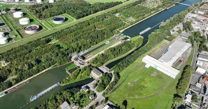 Aerial drone view a inland shipping sluice over the rhine herne canal in Germany.