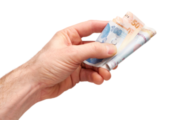A hand holding, giving or paying Turkish Lira in 50 and 100 banknotes, paper currency, isolated against a transparent background.