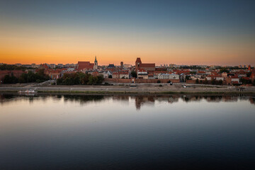 Fototapeta na wymiar Wisla river by the Torun city at sunset, Poland.