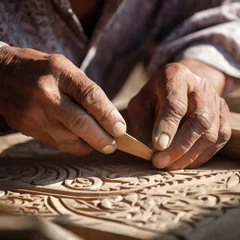 Foto op Plexiglas uzbekistan closeup hands carving. © mindstorm
