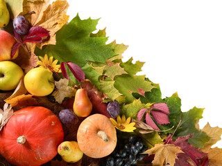 Naklejka na ściany i meble frame of fruits and vegetables on maple leaves, autumn season background, autumnal harvest in garden