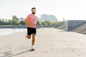 The man is happy slim and hardy warm-up cardio exercises. Motivation for a healthy and active...