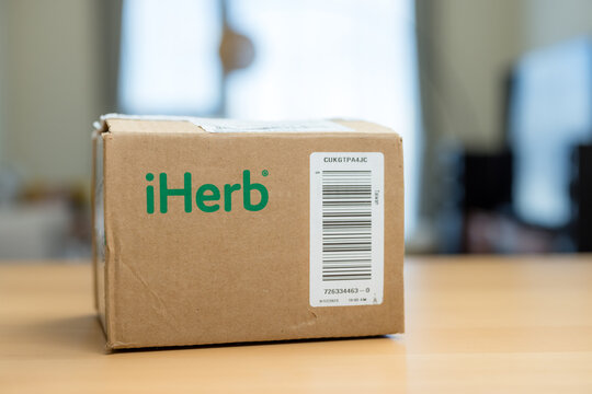 box of iherb parcel at home