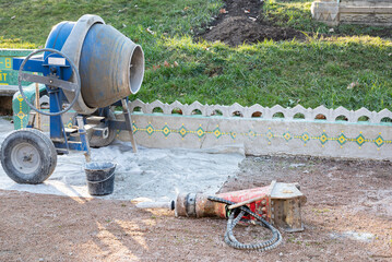 blue concrete mixer.beton mixer in a construction site