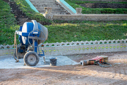 blue concrete mixer.beton mixer in a construction site