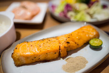 Fried salmon fillet dish in restaurant