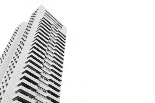 Low angle view of a modern white skyscraper in perspective with transparent background and copy space. Architecture background concept