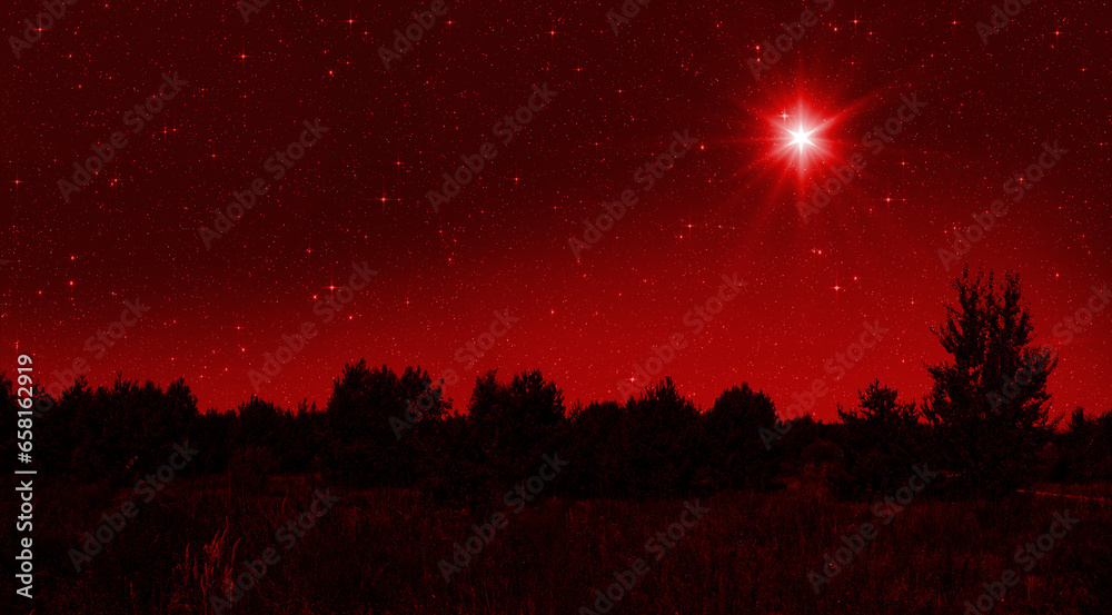 Wall mural bright star shines over the manger of christmas of jesus christ on red starry sky