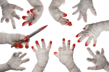 Many painted hands, in the style of Halloween.