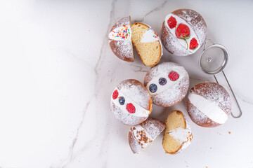 Homemade italian sweet Maritozzi buns, breakfast dessert brioche stuffed with whipped cream, with various topping, nuts, fruit 