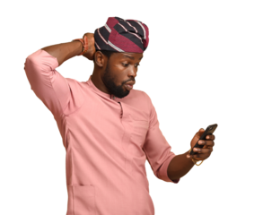 Amazed happy man, excited as he reacts to lottery winnings via mobile app feeling a great positive surprise reaction with his hands behind his head, With Copy Space on a brown isolatable backdrop