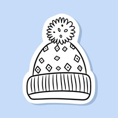 Children's hat warm winter clothes. warm knitted hat with ponpon pompom with scandinavian pattern winter doodles isolated on white background drawn by line winter sticker