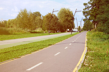 jogging and cycling paths in a park with beautiful markings on a sunny day