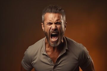 Fototapeta premium Man expressing determination against a gritty brown background - Studio Shot - Resolute spirit - AI Generated