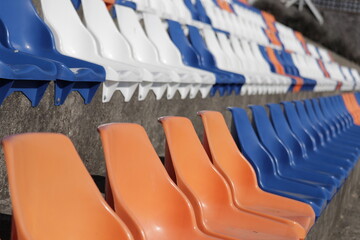 A row of plastic seats