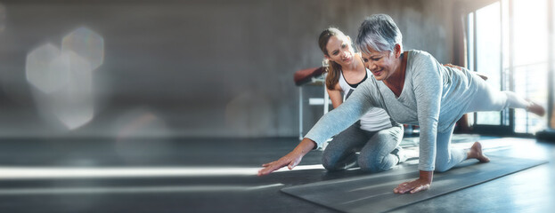 Exercise, mockup and mature woman in gym with personal trainer workout, help and stretching on banner. Info space, fitness and senior person with physio floor challenge, coaching motivation and bokeh