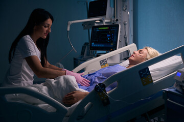 Medical specialist examines the patients abdomen