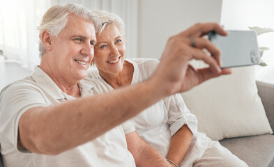 Old couple, selfie and happy on sofa in home, living room or apartment in retirement with post on social media. Mature, people and smile in profile picture, live stream or video call with smartphone