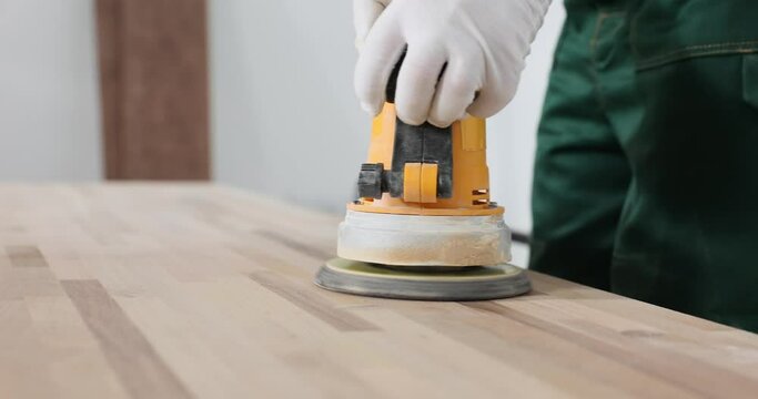 Process of sanding wooden tables. Sander to remove defects on wood concept