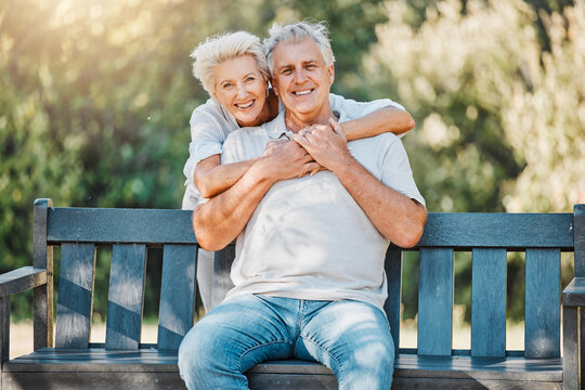 Senior happy couple, portrait or hug on park bench for love, support or bonding retirement trust in nature garden. Smile, relax or elderly woman embrace man in Australia backyard for marriage loyalty
