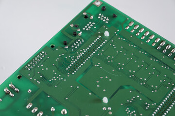 PCB with paths and pin holes.
