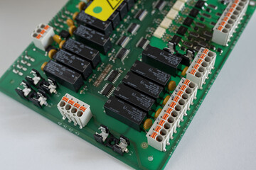Detail of the circuit board with terminal block and relay.
