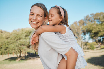 Obraz premium Piggyback, portrait and happy family child, mother and people enjoy nature time together, love or fun outdoor game. Happiness, care and walking woman, mama or mom bonding, carry and support young kid