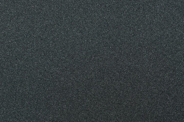 Close up of skateboard grip tape. Macro photograph of sandpaper texture. Skateboarding concept - obrazy, fototapety, plakaty