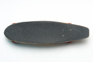 Skateboard. Penny board. Small cruiser board. Wooden board. Vintage skateboard concept. Used penny...