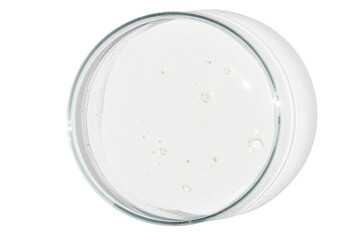 Petri dish isolated on empty background. A smear of a transparent gel, serum in a Petri dish.