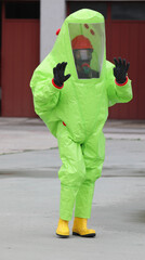 person wearing full protective gear and self-contained breathing apparatus  during the analysis of...