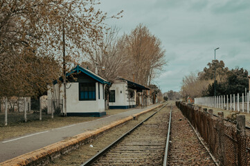 Naklejka premium old house and train station in a very small town in Argentina, tradition, train