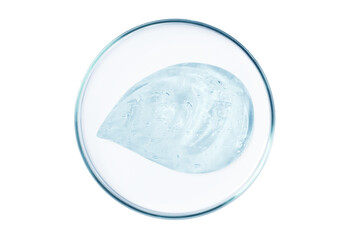 Petri dish with a drop and a smear of a transparent gel or serum on an empty background.