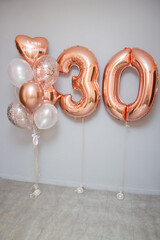 set of pink balloons and number "30" birthday balloons, inscription: "Happy Birthday"