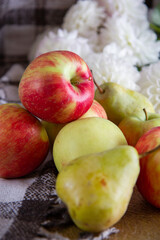 bright fresh apples and flowers on the table