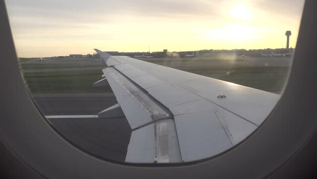 Stockholm, Sweden An airplane wing of an airliner on the tarmac at Arlanda Airport is ready for takeoff. 