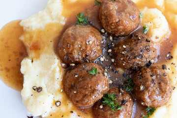Close up meat balls with mashed potatoes
