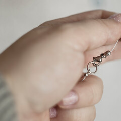 Hand Holding Stainless Steel Necklace Clasp