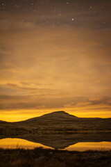 night over stone desert with lake