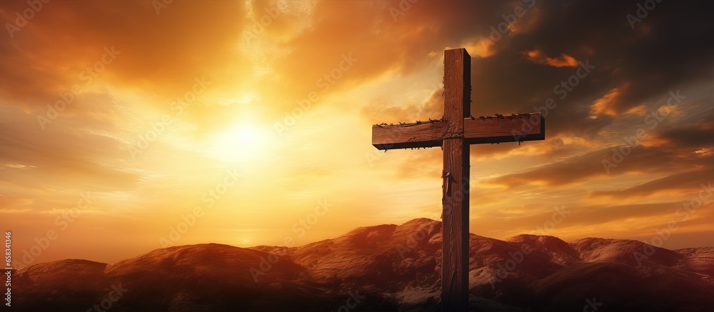 Wall mural illustration of a large wooden christian cross at sunset with copy space on the right side