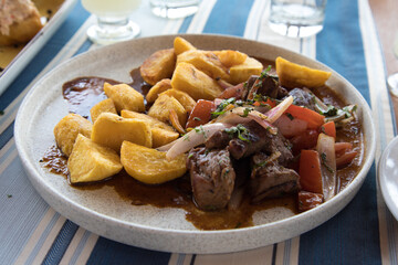 Lomo saltado plato tipico cocina peruana Peru comida