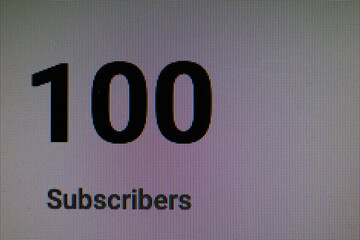 100 subscribers shown on a lcd monitor
