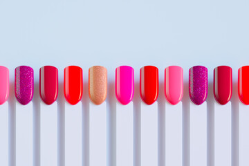 A collection of colorful nail polish swatches in various shades and finishes - 658364177